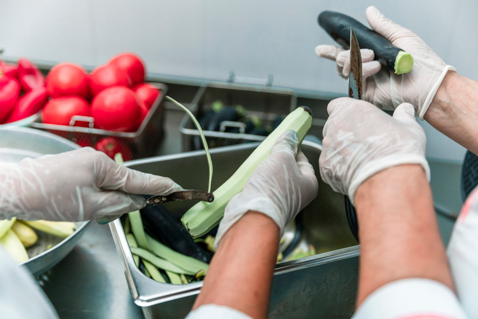 Peeling or cutting vegetables in the kitchen. High quality photo